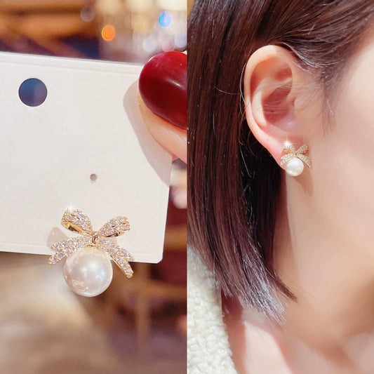 Golden Bow White Pearl Stud Earrings
