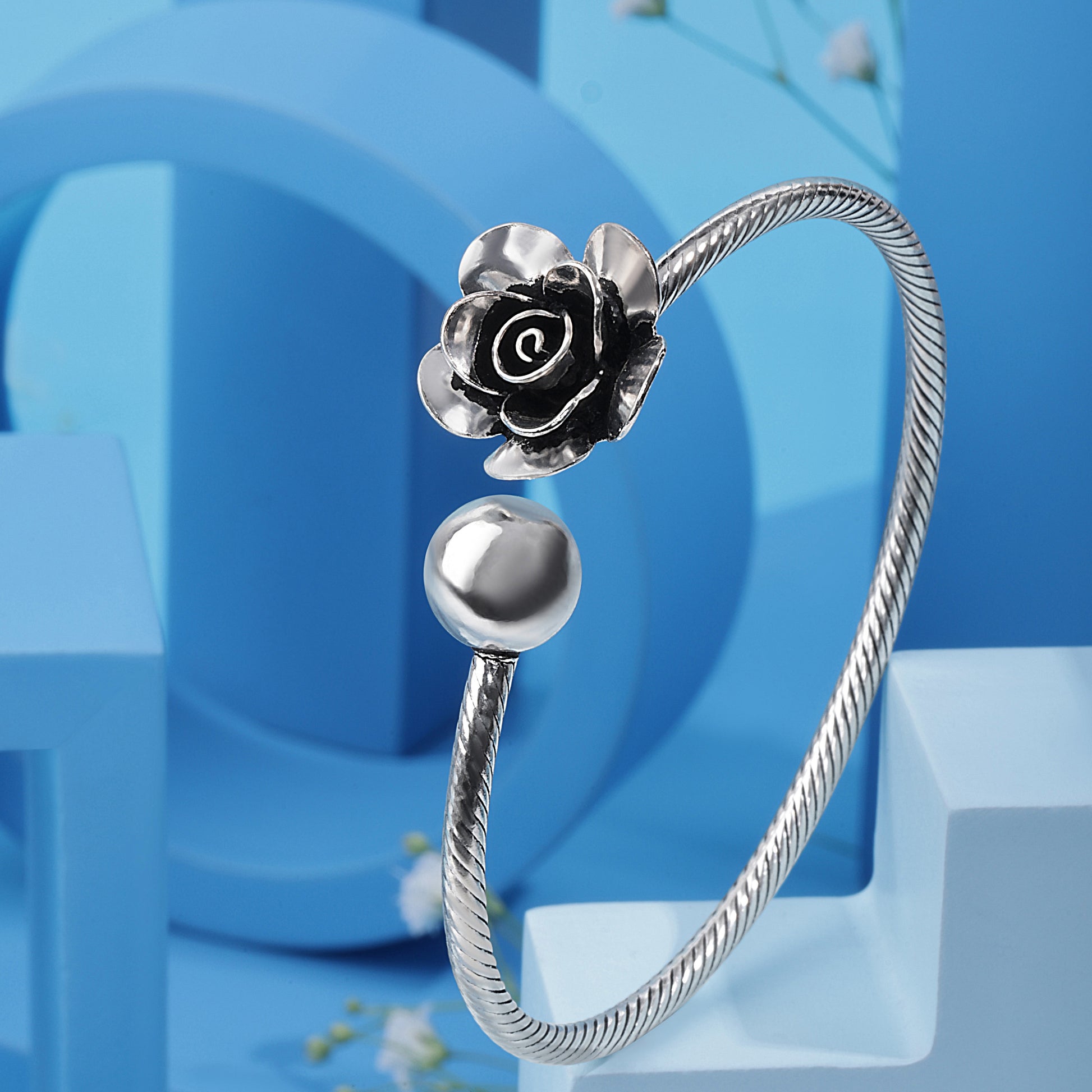 "SILVISH 'Floral Finesse' Oxidised 925 Silver Bangle - Anti Tarnish Women's Jewellery" With Blu Background