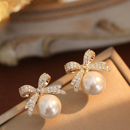 Golden Bow White Pearl Stud Earrings