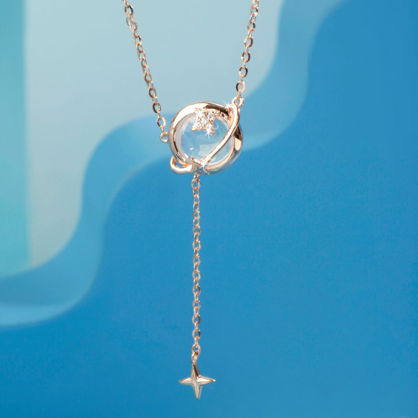 Rose Gold Crystal Saturn Pendant